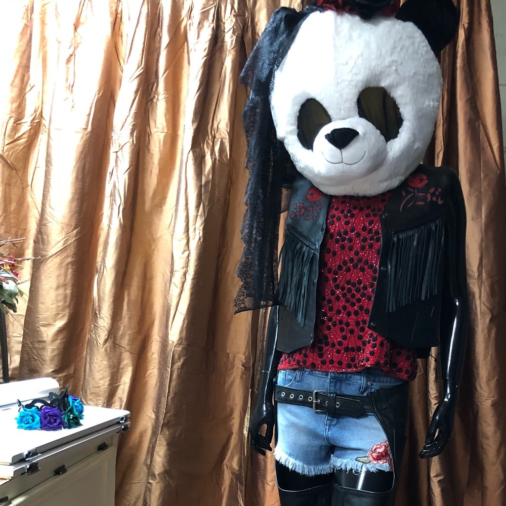 Motorcycle leathers.  Chaps and vest.